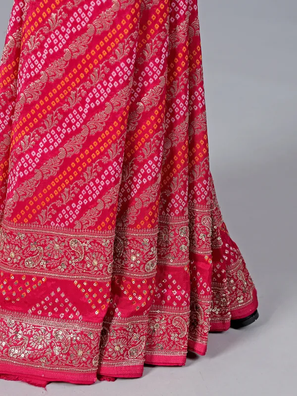 Rani pink dola silk saree with bandhej print accents