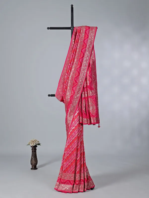 Rani pink dola silk saree with bandhej print accents