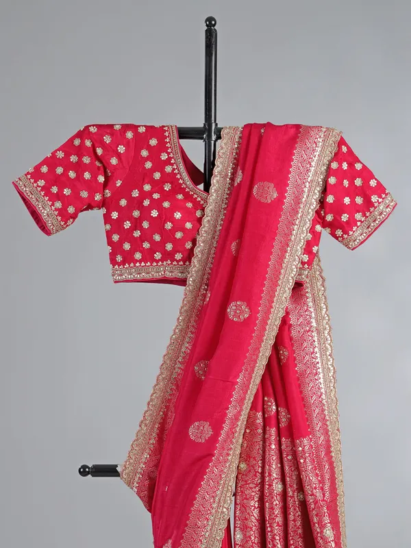 Rani pink dola silk saree with heavily embellished blouse