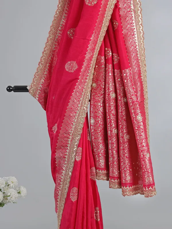 Rani pink dola silk saree with heavily embellished blouse