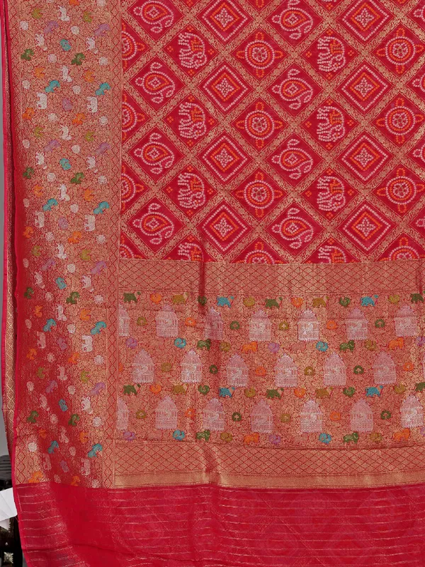 Rani pink georgette saree with colorfull motifs and Print