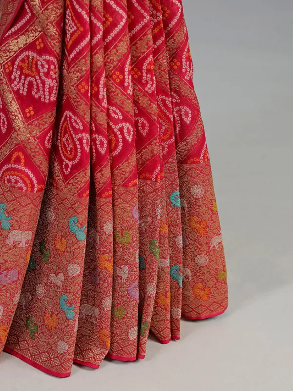 Rani pink georgette saree with colorfull motifs and Print