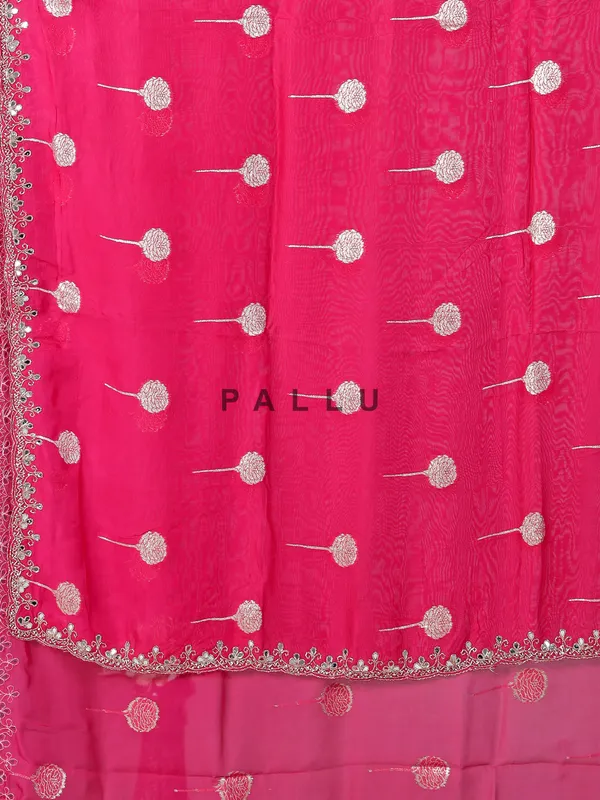 Rani pink organza saree with zari detailing