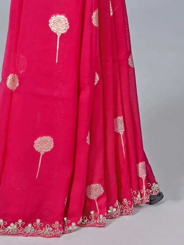 Rani pink organza saree with zari detailing