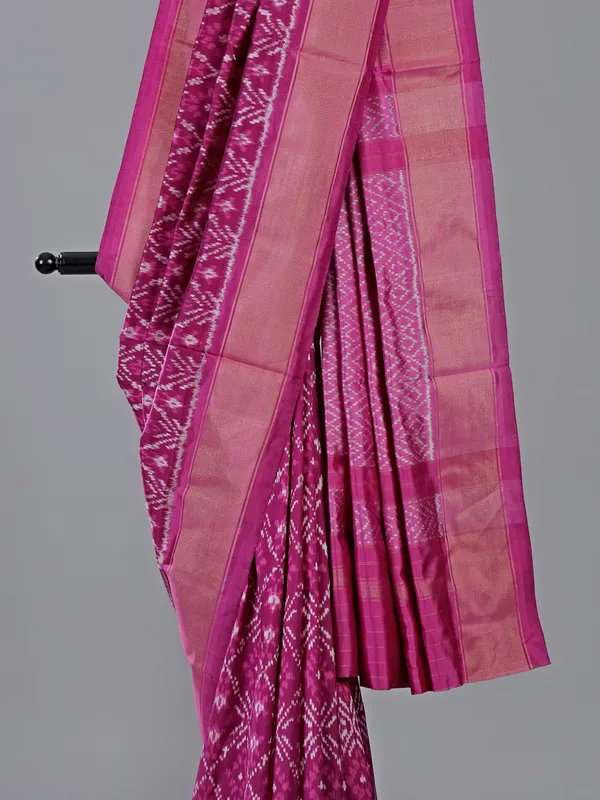 Rani pink patola silk saree with vibrant prints