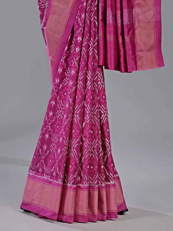Rani pink patola silk saree with vibrant prints