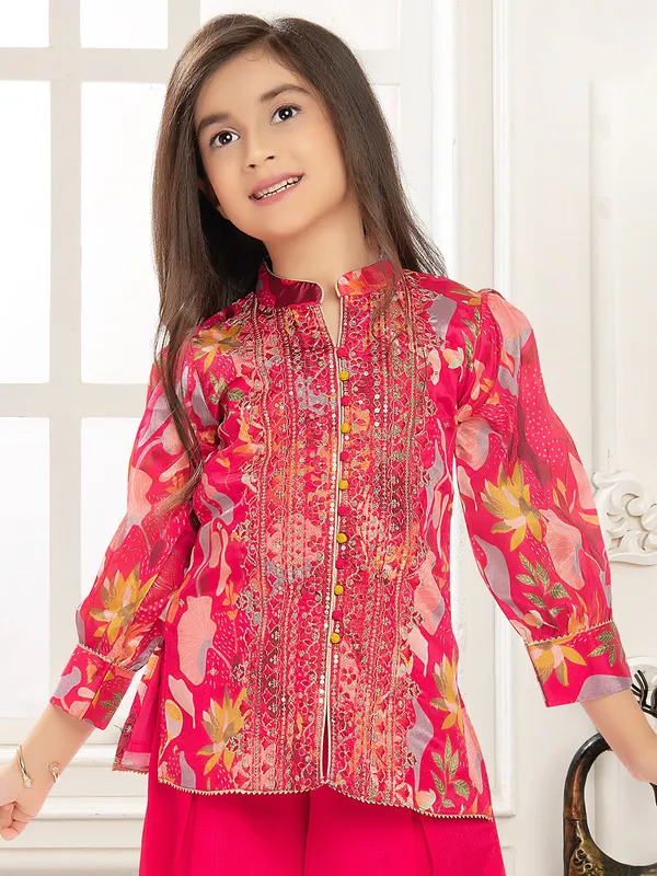 Rani pink printed silk palazzo suit with resham work