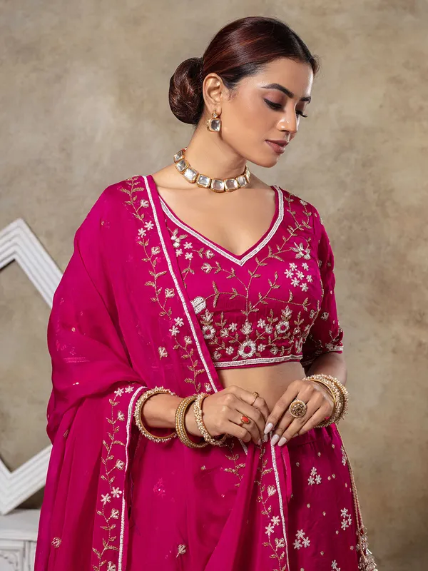 Rani pink raw silk lehenga choli for weddings