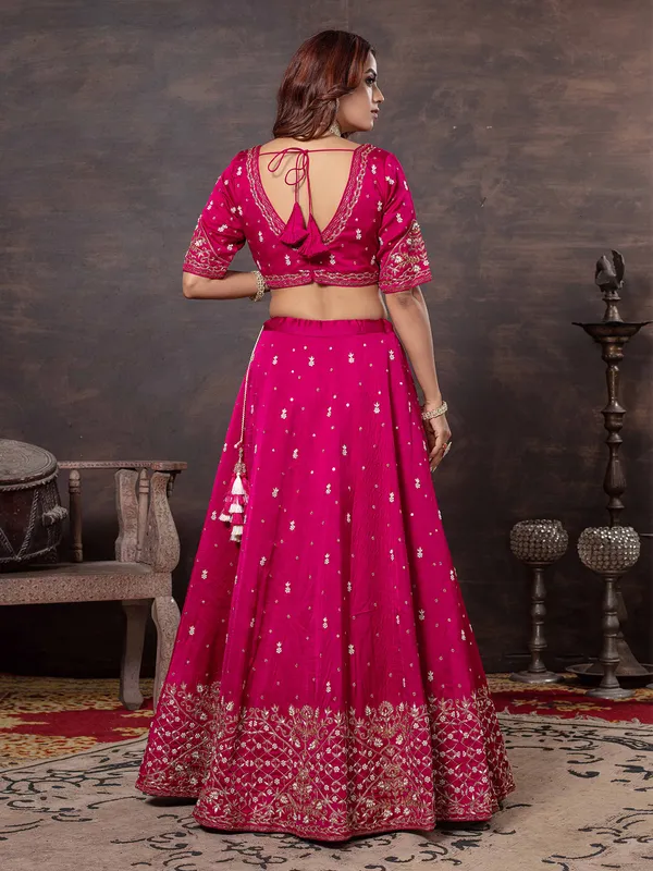 Rani pink raw silk lehenga choli for weddings