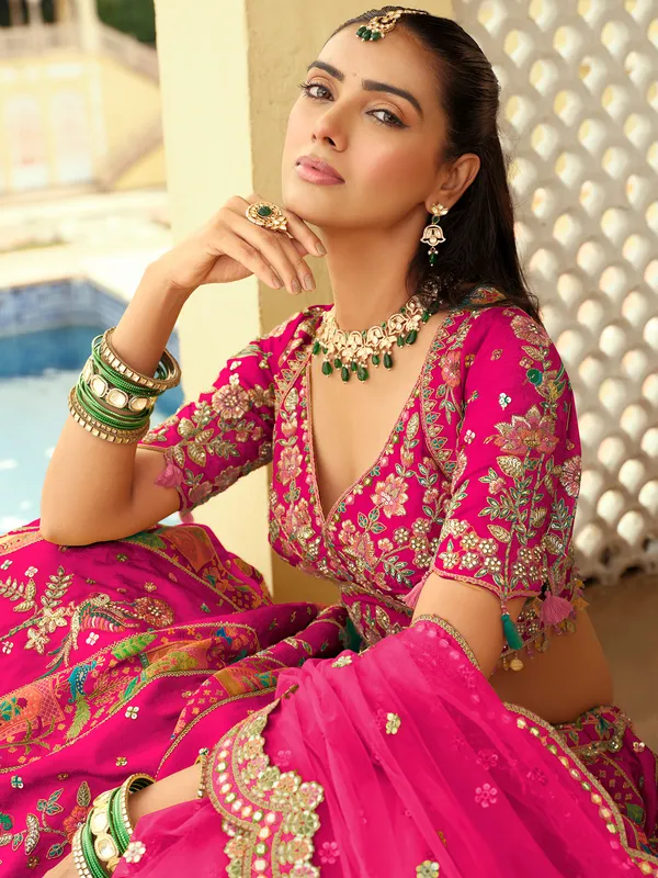 Rani pink regal peacock lehenga choli for wedding wear