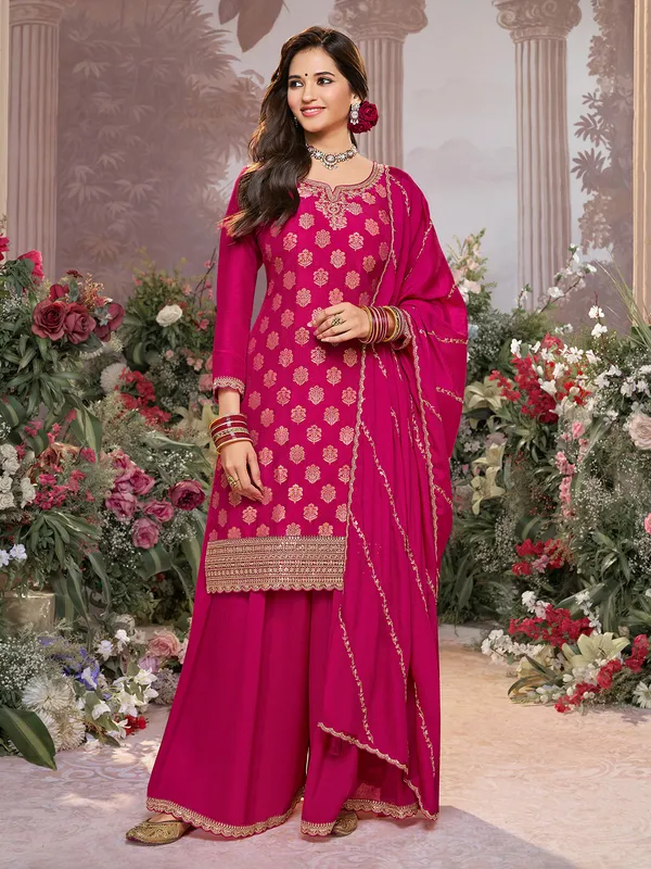 Rani pink silk embellished pakistani suit