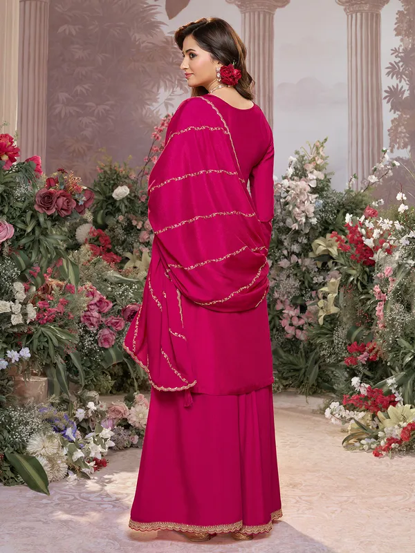 Rani pink silk embellished pakistani suit