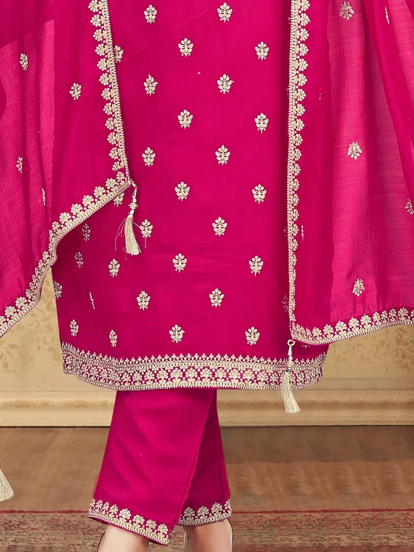 Rani pink silk salwar suit with resham elegance