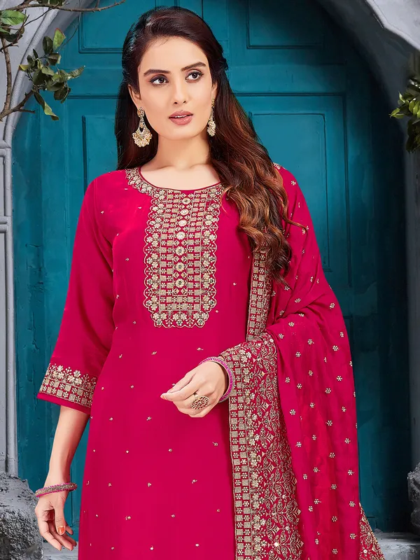Rani pink silk salwar suit with resham work