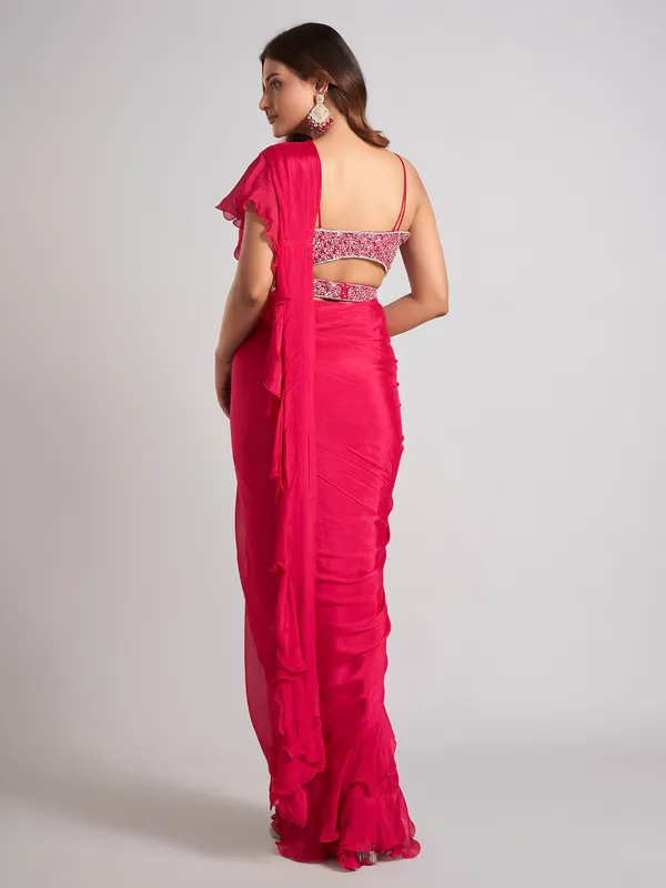Rani pink silk saree with sparkling aabla accents