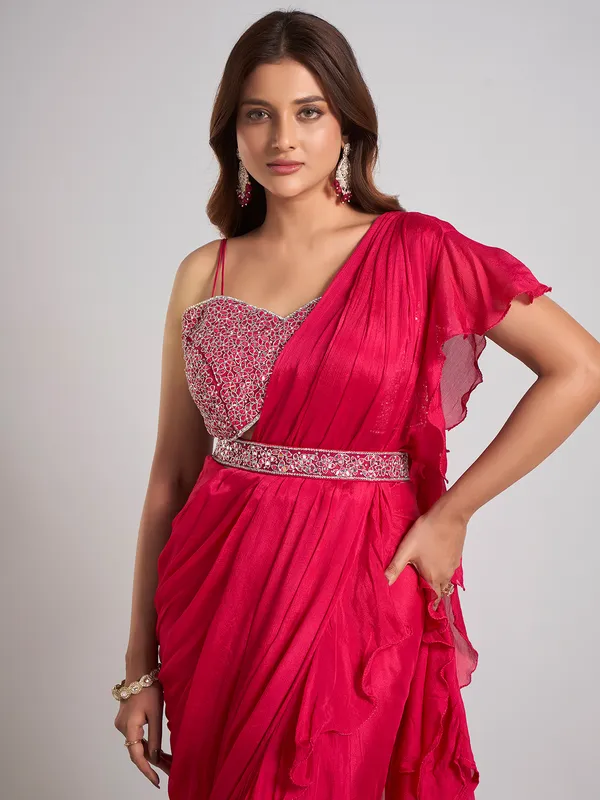 Rani pink silk saree with sparkling aabla accents