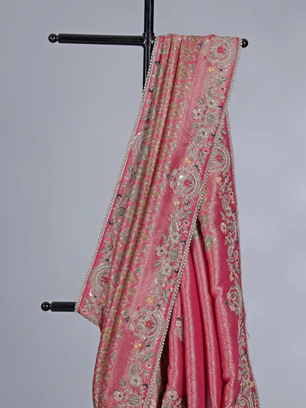 Rani pink tissue silk saree for wedding celebration