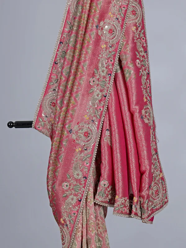 Rani pink tissue silk saree for wedding celebration