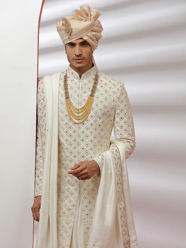 Raw silk cream color groom and wedding sherwani