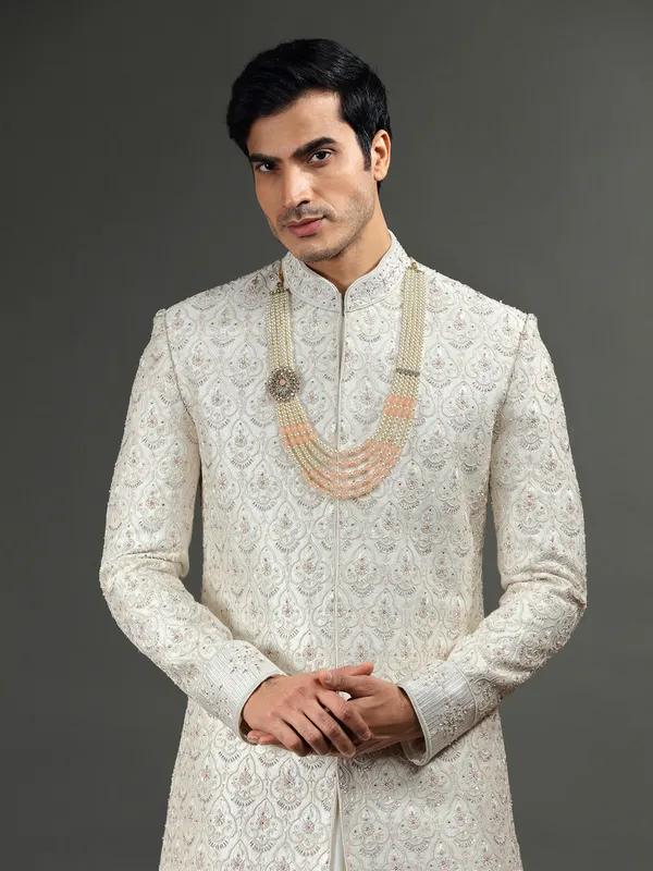 Raw silk groom sherwani in off white