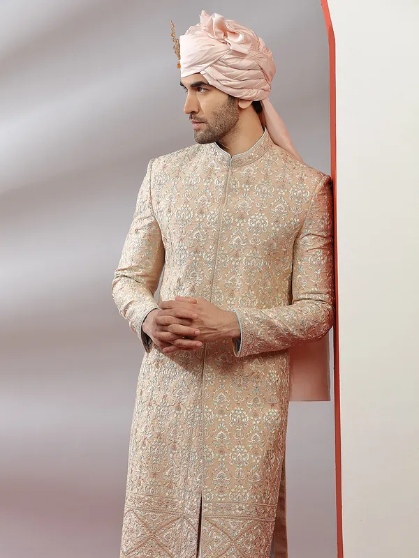 Raw silk groom wear sherwani in peach color