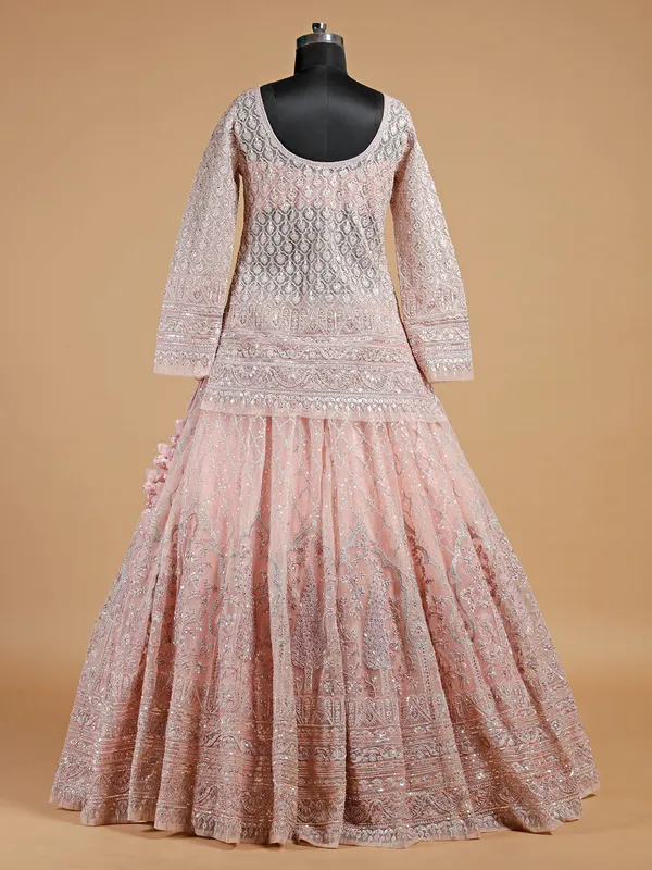 Reception wear peach net lehenga choli