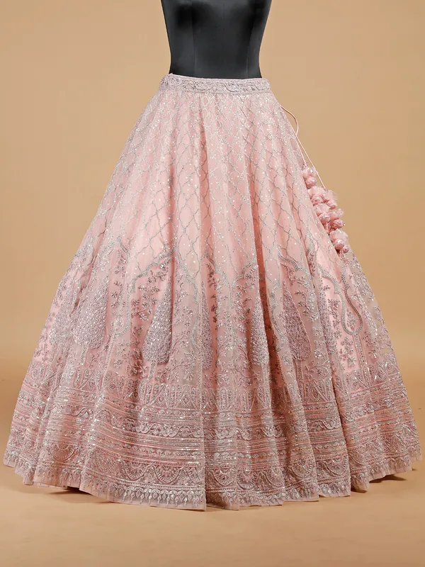 Reception wear peach net lehenga choli