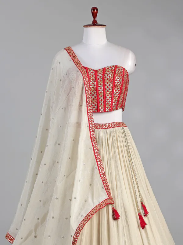 Red and cream silk lehenga choli with sequins work