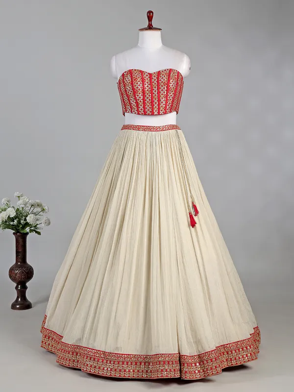 Red and cream silk lehenga choli with sequins work