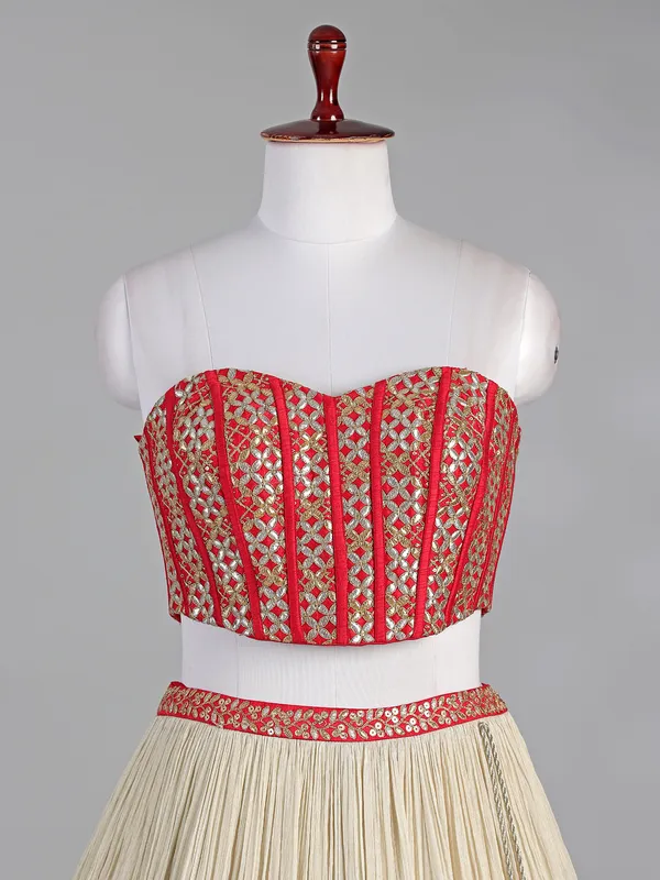 Red and cream silk lehenga choli with sequins work
