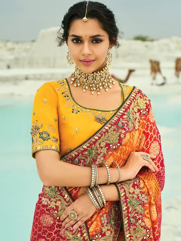 Red and mustard yellow bandhej wedding saree