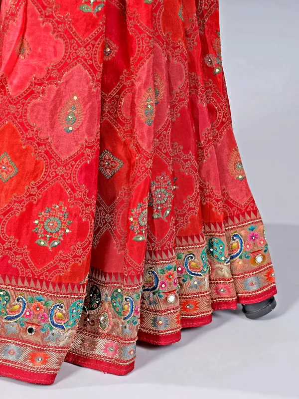 Red and pink silk saree with subtle zari highlights