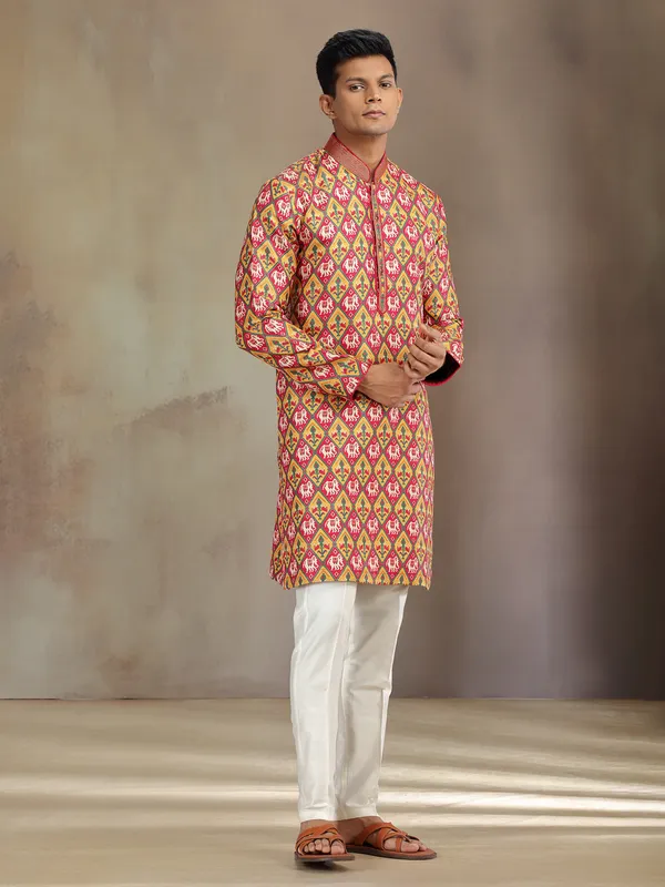 Red and yellow printed brocade silk kurta pajama for festive wear