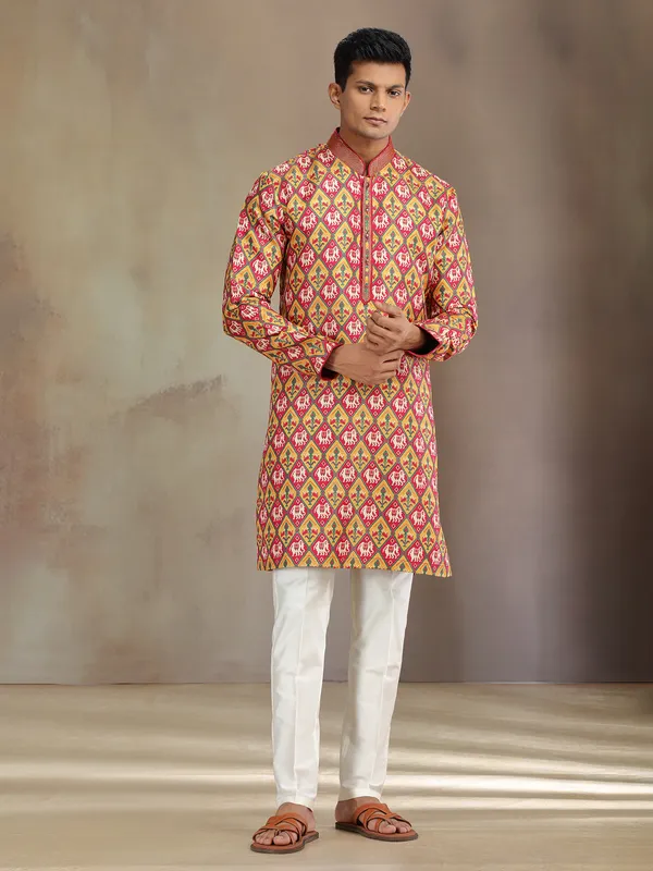Red and yellow printed brocade silk kurta pajama for festive wear