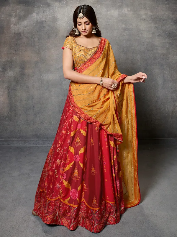 Red and yellow printed silk lehenga choli