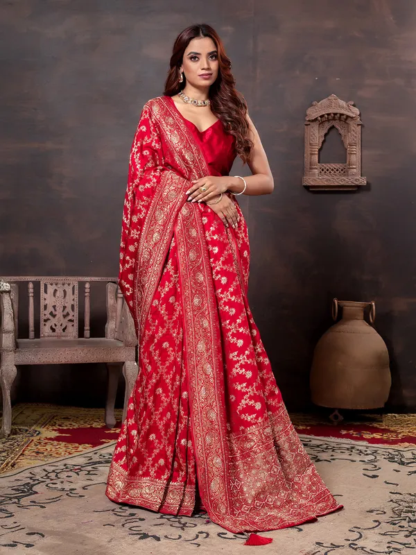 Red beads embellished saree in dola silk