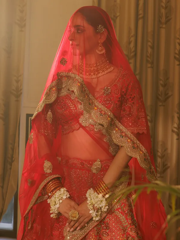 Red bridal silk lehenga choli with thread work