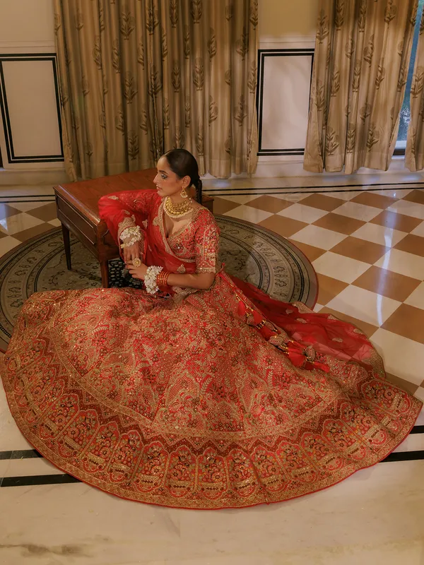 Red bridal silk lehenga choli with thread work
