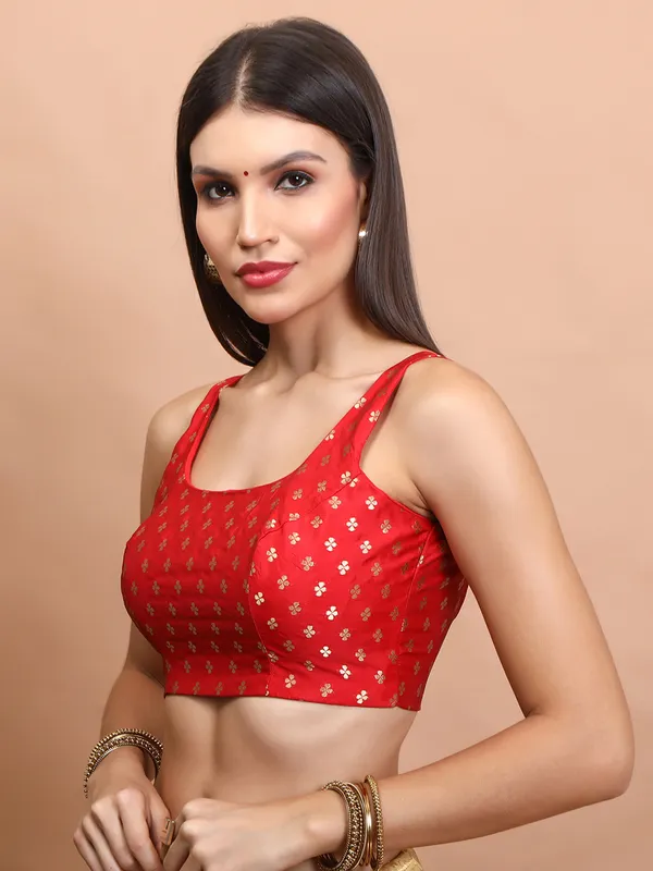 Red brocade sleeveless zari weaving blouse
