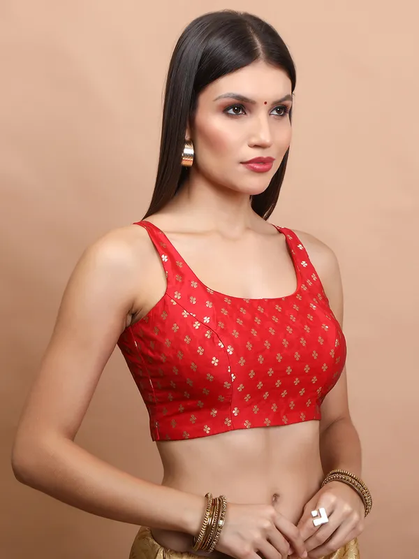 Red brocade sleeveless zari weaving blouse