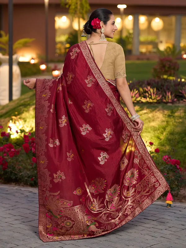 Red dola silk saree with zari stone weaving