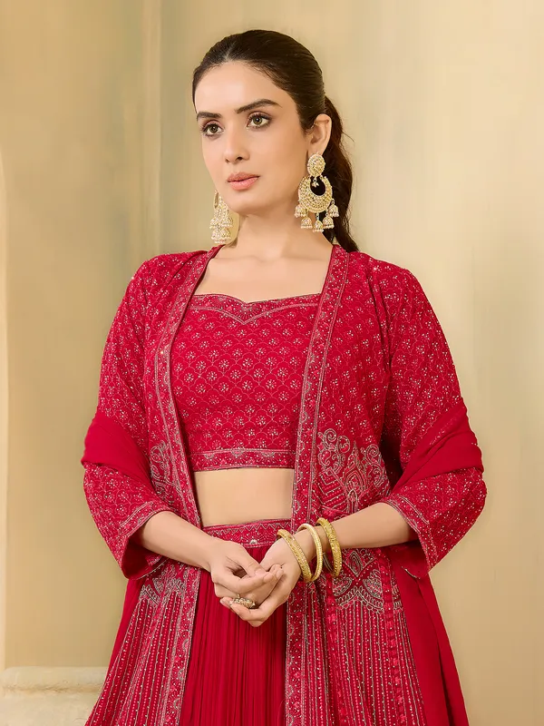 Red embroidered jacket style lehenga choli
