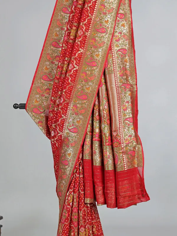 Red georgette saree with colorfull motifs and print