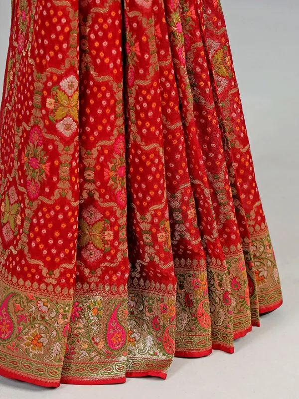 Red georgette saree with colorfull motifs and print