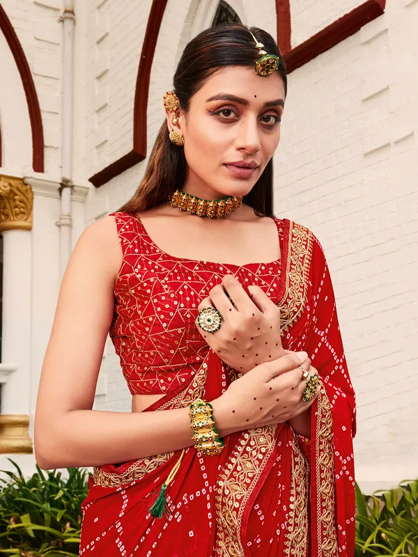 Red georgette saree with embroidery border