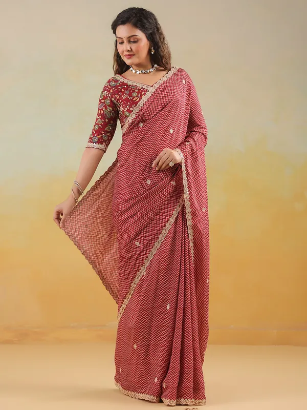 Red muslin printed saree with ready made blouse