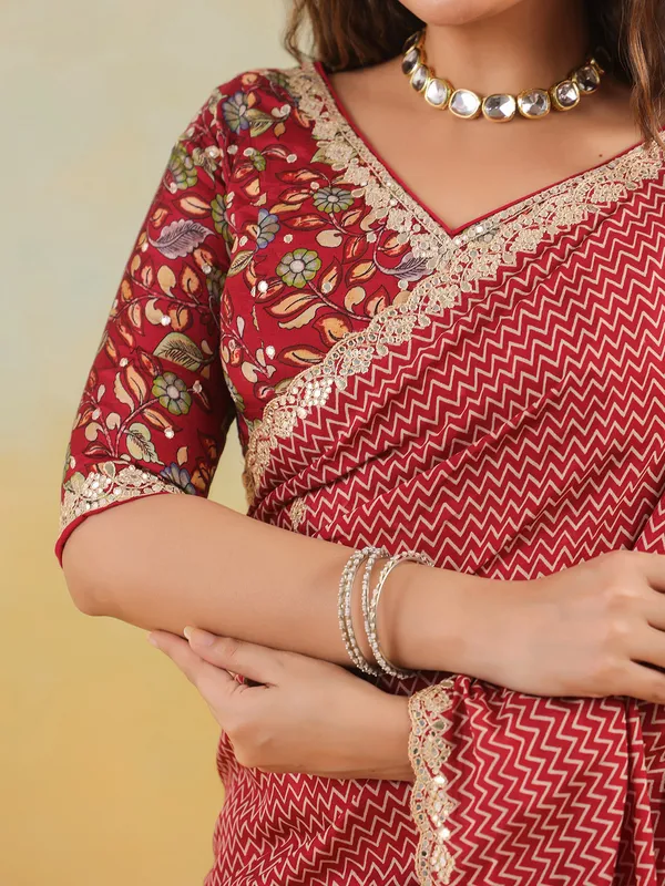 Red muslin printed saree with ready made blouse