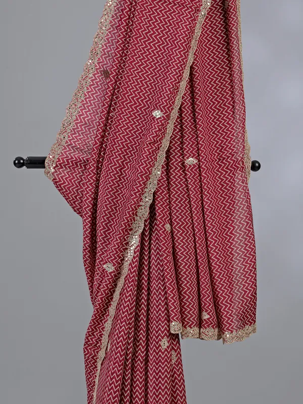 Red muslin silk printed saree with gota accents