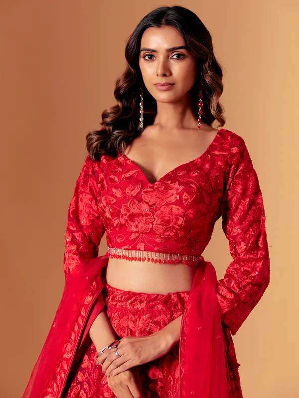 Red net embroidered lehenga choli for wedding wear