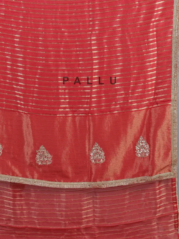 Red organza saree with traditional highlights